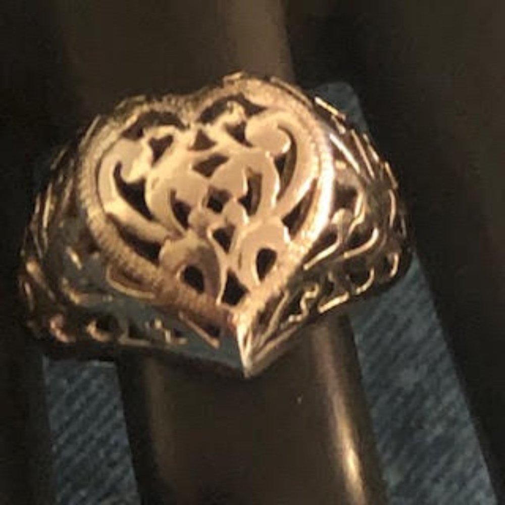 Lovely Silver Tone Heart Shaped Raised Ring with Designs on sides